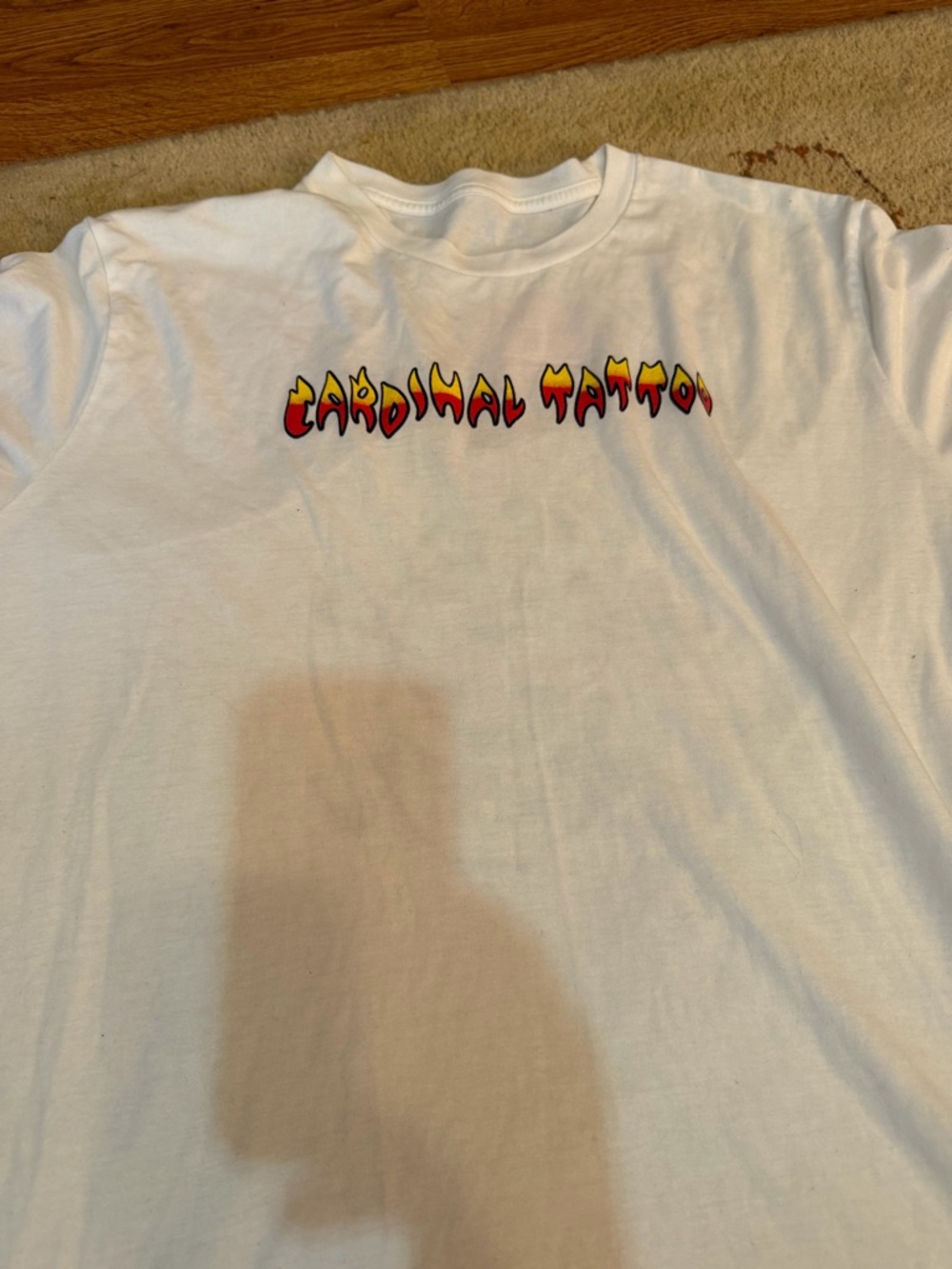 White Tee with 'Cardinal Tattoo' Flame Logo